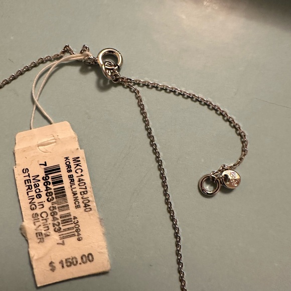Michael Kors Sterling Silver Necklace with Charm and MK detail. New with Tag. - Picture 10 of 10
